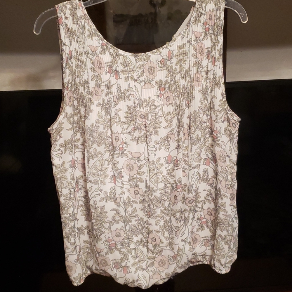 Sleeveless sheer floral blouse